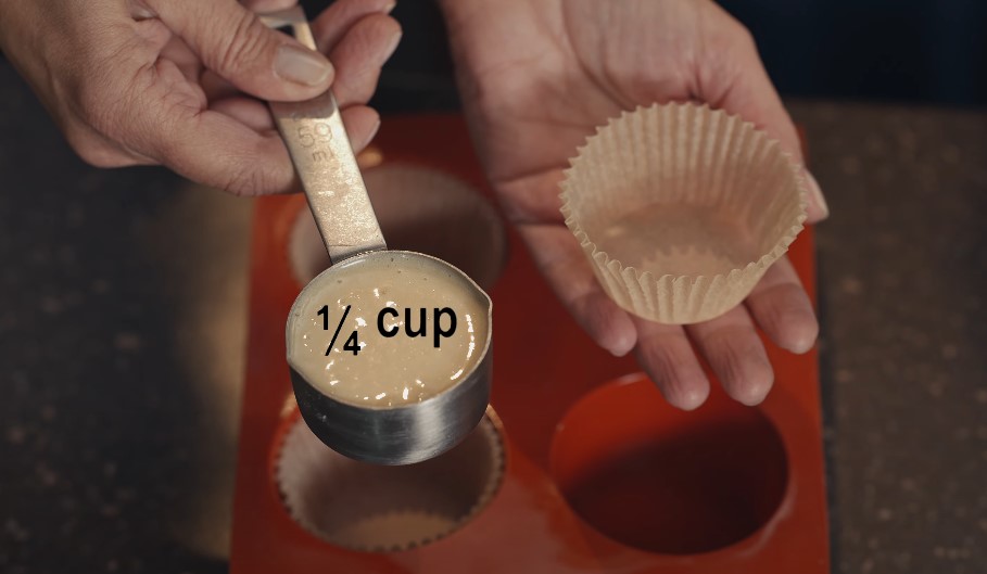 Measuring out a precise 1/4 cup of batter