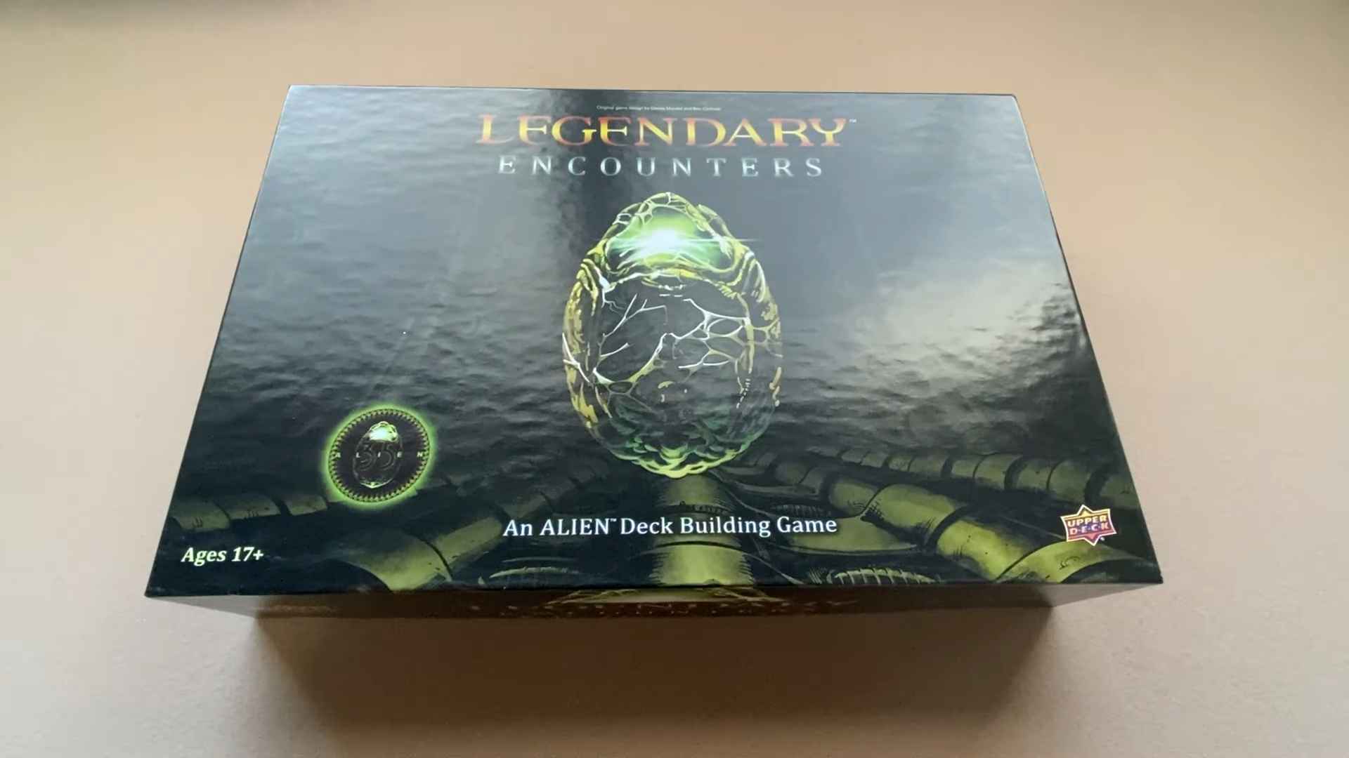 Box cover of Legendary Encounters: An ALIEN Deck Building Game featuring an alien egg
