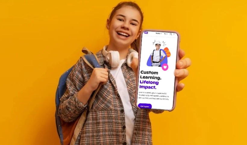 A young student displays a phone showcasing personalized learning opportunities