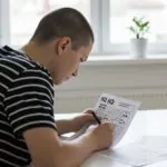 A person working through a challenging IQ test