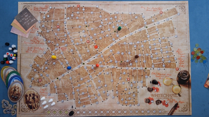 Letters from Whitechapel board setup showing the detailed map of London with investigator tokens, clue markers, and player components arranged around the board