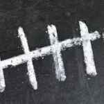 Tally marks on a blackboard